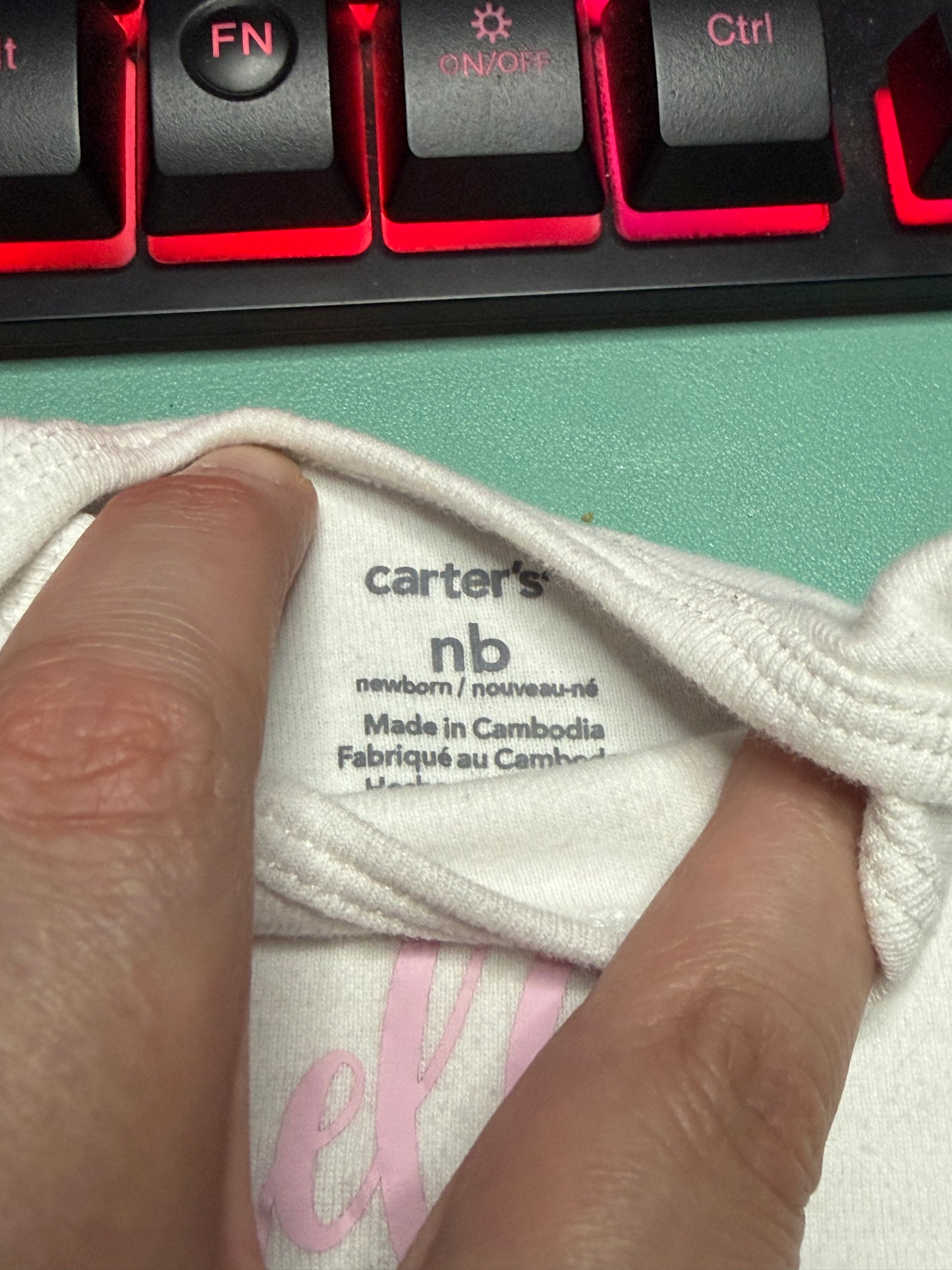 Newborn “hello I’M NEW HERE” Onesie – Carter’s – NB